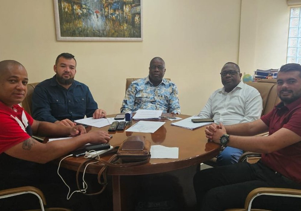 Team seated around the boardroom table