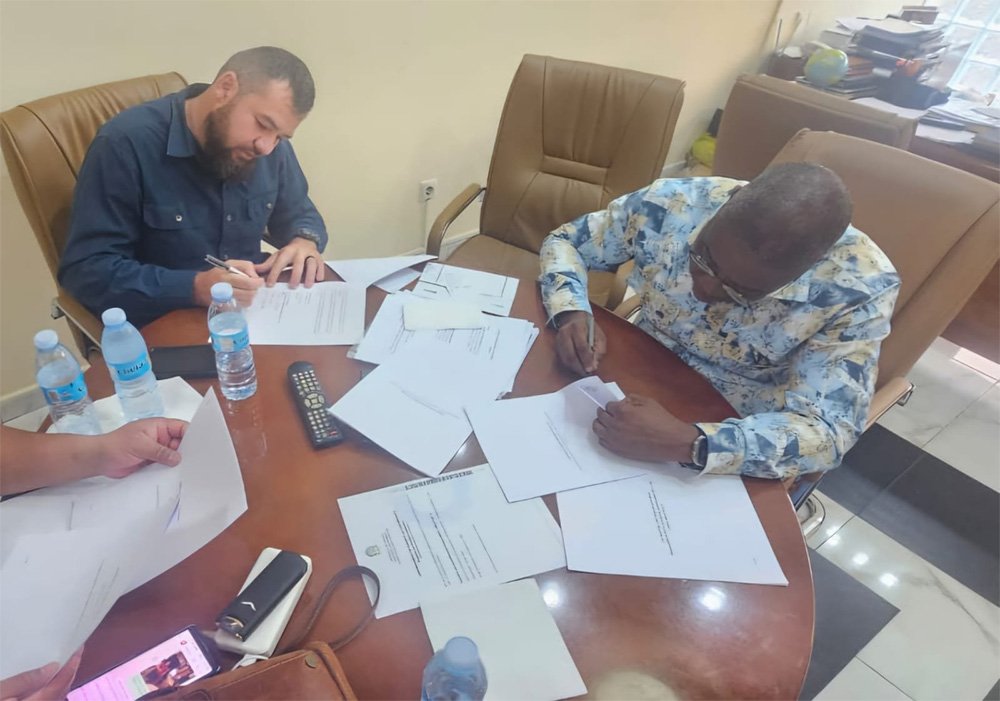 Signing important documents at the table